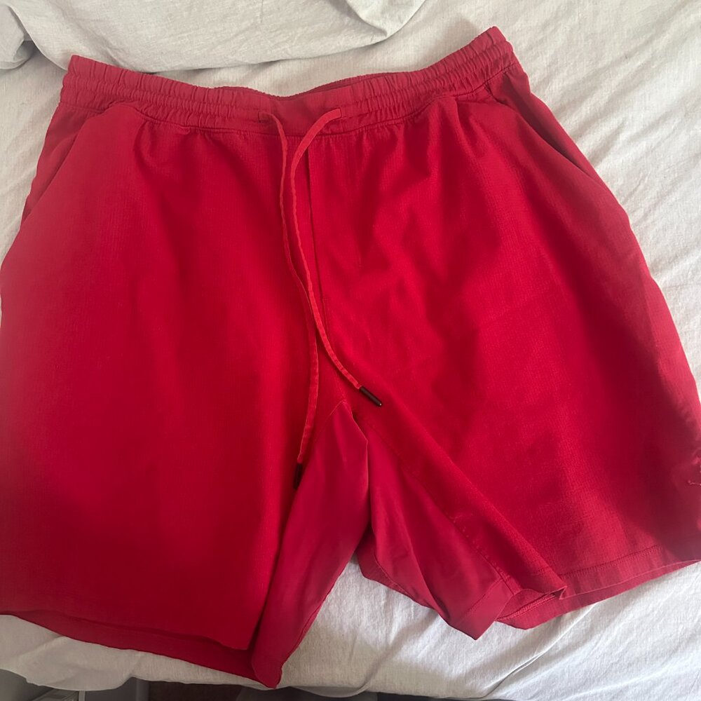 XL LULULEMON LINERLESS SWIM TRUNKS 7"